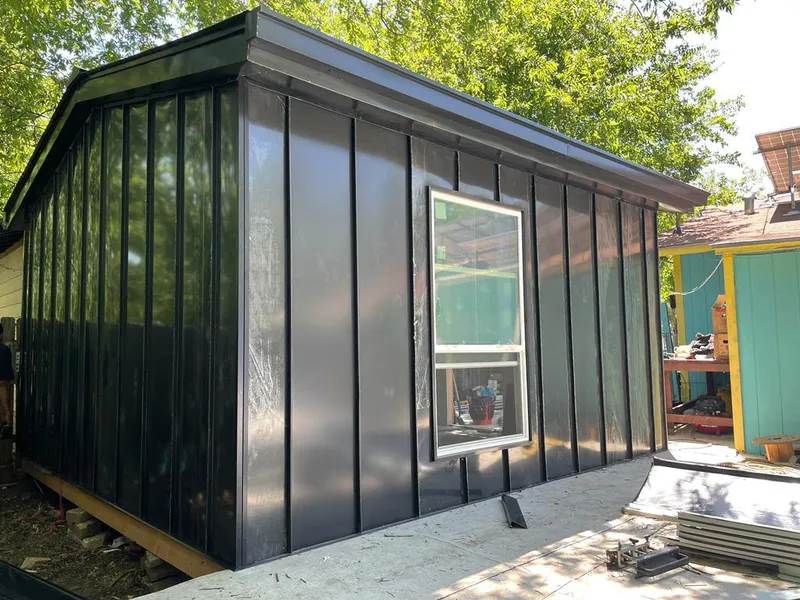 Black standing seam metal wall panels for Roof Inspection in Ahuimanu