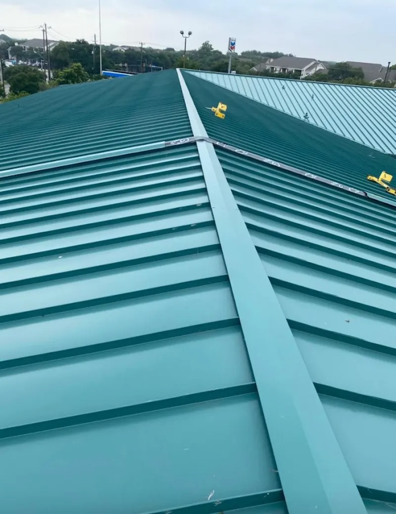 Green commercial metal roof ridge and valley for Metal Roof Repair in Ahuimanu